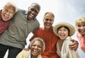 Multi ethnic Group of Friends Laughing on the beach Royalty Free Stock Photo