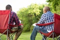 Multi-Ethnic group of friends talking and having a bible study. Royalty Free Stock Photo