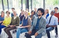 Multi-Ethnic Group of People in Seminar Royalty Free Stock Photo
