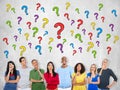 Multi-Ethnic Group of People Thinking and Question Marks Royalty Free Stock Photo