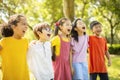 Multiethnic group of school children laughing and embracing Royalty Free Stock Photo