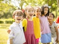 Multiethnic group of school children laughing and embracing Royalty Free Stock Photo