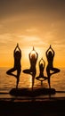 A multi-ethnic group of women practicing yoga on a beach at sunrise. Yoga concept Royalty Free Stock Photo