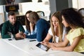 Multi-ethnic group of young people studying with laptop computer Royalty Free Stock Photo