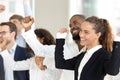 Multiracial businesspeople teammates celebrating business success standing in office room Royalty Free Stock Photo