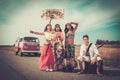 Multi-ethnic hippie hitchhikers Royalty Free Stock Photo