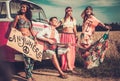 Multi-ethnic hippie hitchhikers Royalty Free Stock Photo