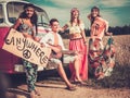 Multi-ethnic hippie hitchhikers Royalty Free Stock Photo