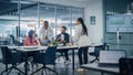 Multi-Ethnic Office Conference Room Meeting: Multicultural Team of Four Creative Entrepreneurs Tal Royalty Free Stock Photo