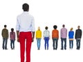 Multi-Ethnic People Turned Back and a Man Left Behind Royalty Free Stock Photo