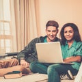 Multi ethnic students couple preparing for exams Royalty Free Stock Photo