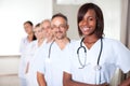 Multi-ethnic team of confident happy doctors Royalty Free Stock Photo