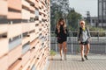 Multi-ethnic women going to the gym for physical exercise. Two girls walking after an outdoor exercise session. Royalty Free Stock Photo