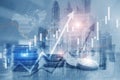 Multi exposure illustration of virtual creative financial chart hologram on growing stacks of coins background Royalty Free Stock Photo