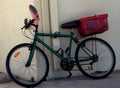 Bicycle With Carrier Against A Wall