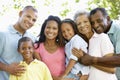 Multi Generation African American Family Walking In Park Royalty Free Stock Photo