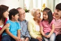 Multi-Generation Chinese Family Relaxing At Home Royalty Free Stock Photo