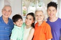 Multi-Generation Chinese Family Relaxing At Home Royalty Free Stock Photo