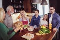 Multi Generation Family Cooking Meal At Home Royalty Free Stock Photo