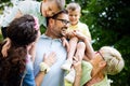 Multi generation family enjoying picnic in a park Royalty Free Stock Photo