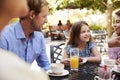 Multi Generation Family Enjoying Snack At Outdoor CafÃ¯Â¿Â½ Together Royalty Free Stock Photo