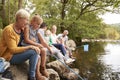 Multi Generation Family Fishing With Nets In River In UK Lake District Royalty Free Stock Photo