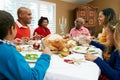 Multi Generation Family having Christmas Meal