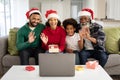 Multi-generation family having a video chat on laptop at home Royalty Free Stock Photo