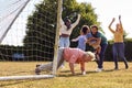 Multi-Generation Family At Home In Garden Playing Football Or Soccer Together Royalty Free Stock Photo