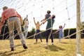 Multi-Generation Family At Home In Garden Playing Football Or Soccer Together Royalty Free Stock Photo