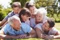 Multi Generation Family Piled Up In Garden Together Royalty Free Stock Photo