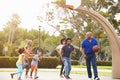 Multi Generation Family Playing Basketball Together Royalty Free Stock Photo