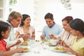 Multi Generation Indian Family Eating Meal At Home Royalty Free Stock Photo