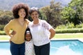 Multi-generation mixed race family enjoying their time at a garden Royalty Free Stock Photo