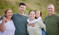 We love doing things together. a multi-generational family spending time together outdoors. Royalty Free Stock Photo