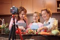 Multi-generational female family of influencers creating vlog about healthy eating