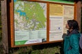 Multi-language interpretive sign and map in Eifel National Park, Germany