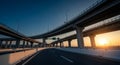 Multi- Level Highway Interchange at Sunset with Dramatic Lighting overpass bridge Royalty Free Stock Photo