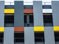 Multi-level parking building for cars. Facade with original colorful geometry Royalty Free Stock Photo