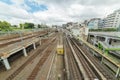 Multi level railway tracks in urban surroundings Royalty Free Stock Photo