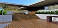Multi-level wooden deck adjoining a chic contemporary home. Tropical plants, comfortable furniture and a red brick bar. 3d render