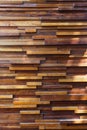 Multi-level wooden texture made of wooden bars of different sizes and colors