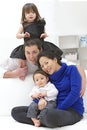 Multi racial family having fun together Royalty Free Stock Photo