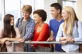 Multi racial student group chatting indoors Royalty Free Stock Photo