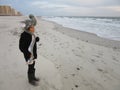 Multi Racial tween girl on beach by ocean Royalty Free Stock Photo