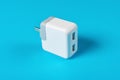 Multi sockets USB charger on blue background