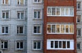 Multi-storey brick house with balconies in the Soviet style