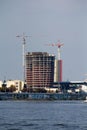 A multi-storey building under construction on the banks of the Dnieper