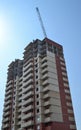 Multi-storey building under construction. Construction crane. Construction of modern housing. Building bussiness. Royalty Free Stock Photo