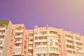 Multi-storey house with lots of windows, balconies and air conditioning. Detail photo of old skyscraper in Russia and Ukrain Royalty Free Stock Photo